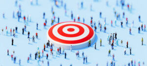 Image of a target surrounded by tiny people